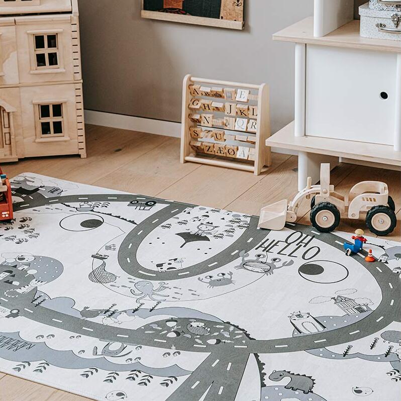 Kinderteppich creme grau mit Straßen und Spielzeug