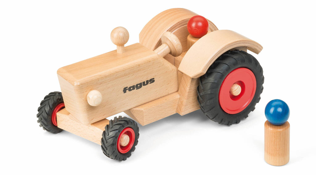 Traktor Holz mit zwei Holzfiguren